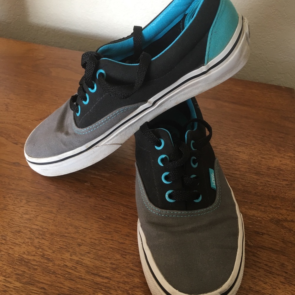Cut pair of Vans sneakers